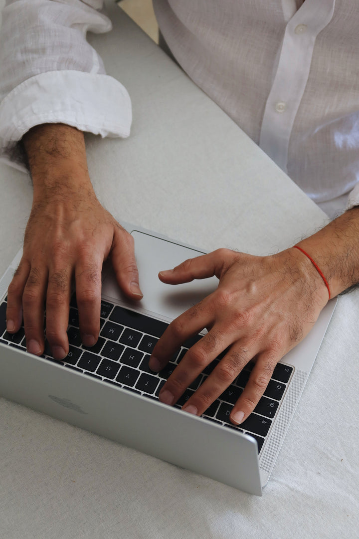 DZIRKSTS RED THREAD bracelet
