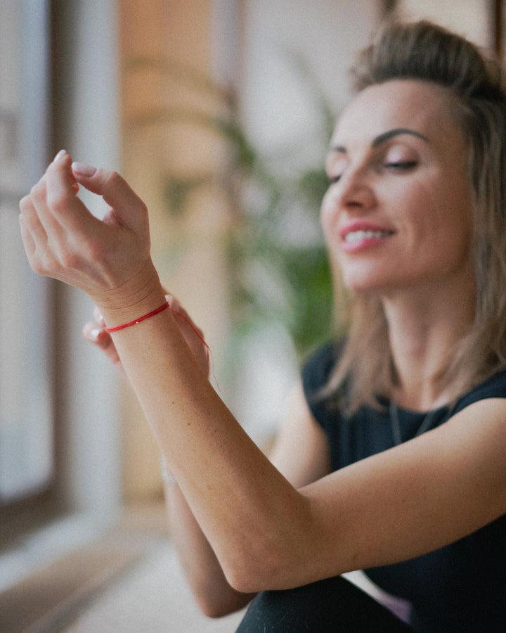 DZIRKSTS RED STRING bracelet